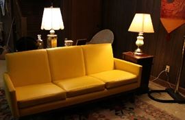 A beautiful yellow vinyl couch from the 60's. In excellent condition.