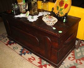 Antique mahogany blanket chest.