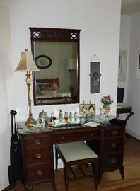 Mahogany dresser with bench and mirror.