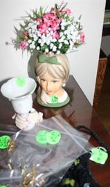 Beautiful ladies head with her flowers.