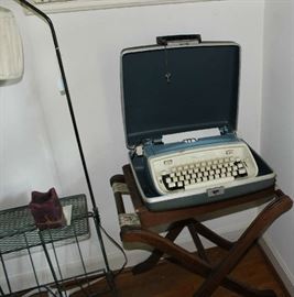 A old Royal manual typewriter on luggage stand.