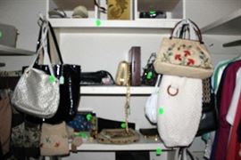 Shoes and purses in master bedroom closet.