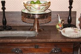Another oak chest with marble top.