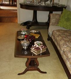Mahogany coffee table with glass insert.