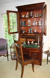 A 1893 Walnut secretary with glass doors and drawers. A beautiful piece in excellent condition.