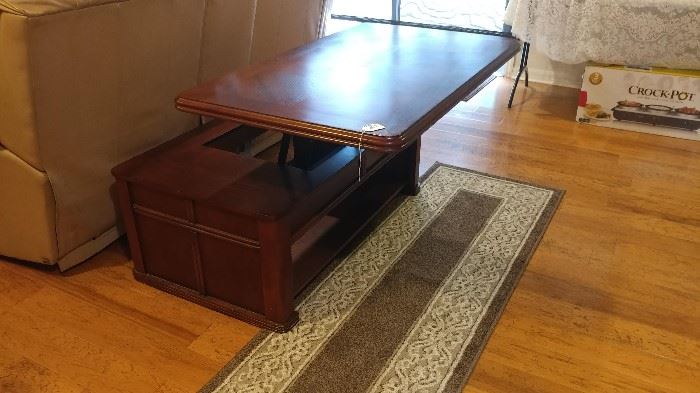 Vintage coffee table that lifts for a dinner table