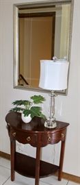 This is a small table by Harden, dazzling mirror, awesome lamp.  