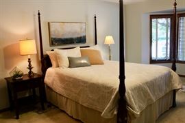 Stickley 4 poster queen size bed, bedding, side tables and lamps.  Neat framed art as well.