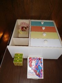 Vintage wooden cabinet with barbie clothes