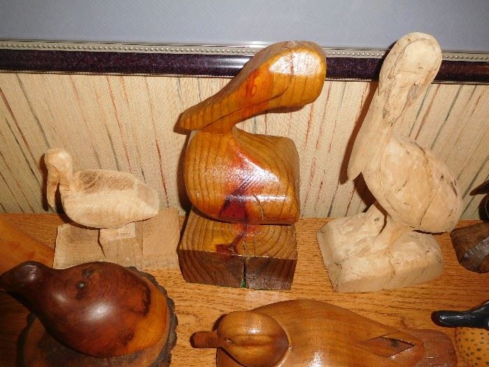 Hand carved pelicans... some signed