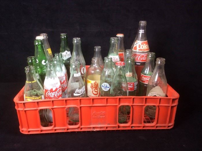 Old coke bottles and carrier