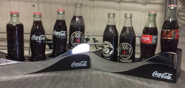 Coke point of sale pieces and vintage bottles
