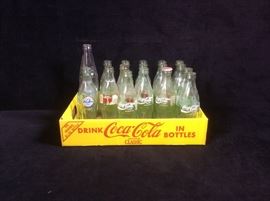 Coke bottles and carrier