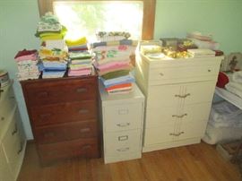 Dressers, file cabinet and bedding linens and towels