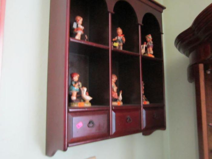 Curio shelf - figures are Enesco