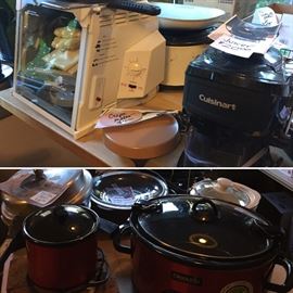 Crock pots, showtime rotisserie, cuisnart juicer, pressure cooker, cast iron pots, pork cooker, and lots more