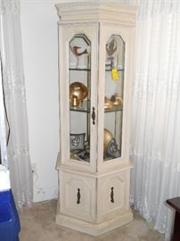 off white lighted curio cabinet with glass shelves