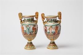 A PAIR OF CAPODIMONTE URNS WITH CLASSICAL SCENES