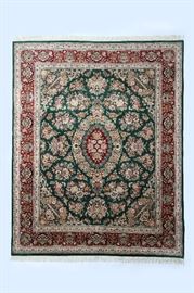 A PAKISTANI FRENCH TABRIZ HAND WOVEN WOOL RUG