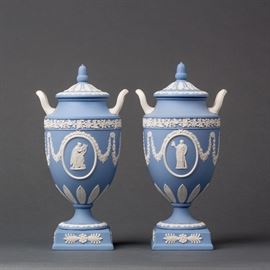 A PAIR OF WEDGWOOD JASPERWARE COVERED URNS