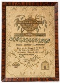AN 1821 DATED CROSS STITCHED MOURNING SAMPLER