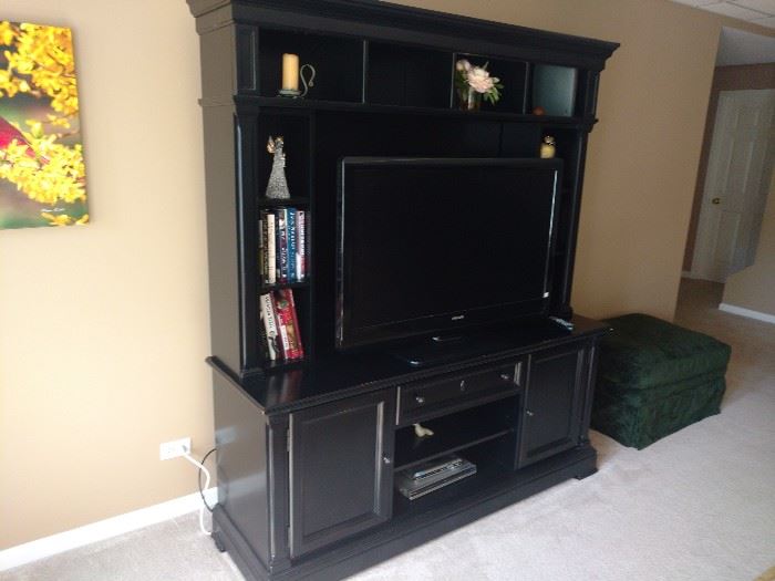 Entertainment center or display for whatever you wish nice smaller size fits anywhere.
