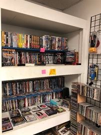 LOTS of dvds, vhs, and cds