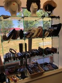 handheld purses, wallets, sunglass cases and glasses