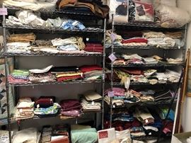 shower curtains, towels, place mats, sheets, bedskirts, blankets, napkins