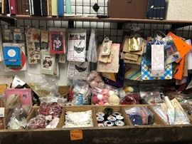 gift bags, yarn, picture frames, bags of crafting items