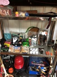 sporting gear. golf items, tennis rackets, and more