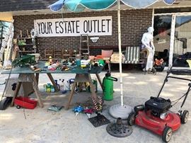 lawnmower, sprinklers, bench, outdoors equiptment, umbrella and umbrella stands