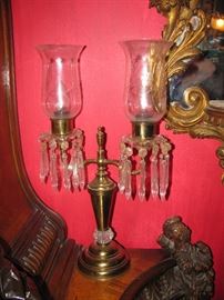 one of a pair of brass and glass electified 2 light lamps
