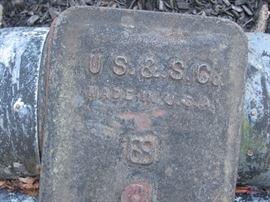 U S & S Co mark on light