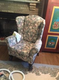Oversized wing chair with big claw feet