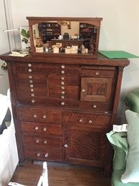 A very rare and beautiful oak dental cabinet in wonderful condition