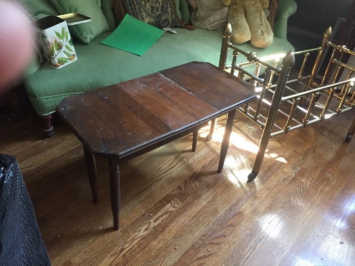 Salesman sample size table with two leaves, antique brass doll bed