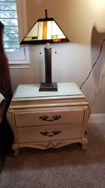 Bedside table and Tiffany-style lamp. There are 2 of each in the sale. 