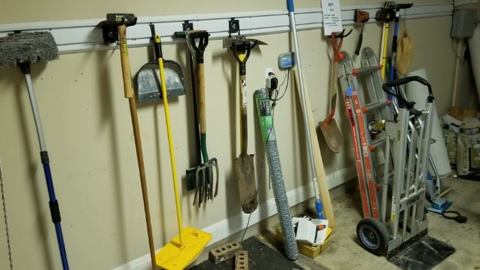 yard tools, dolly and more in the garage