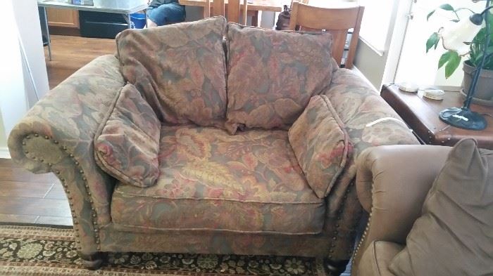 Extra roomy ...Oversized Chair, upholstered, rolled arms and decorative pillow included.