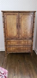 3 hidden drawers behind the doors. Total 5 drawer tall boy chest 5' tall x 38" wide x 19" deep.