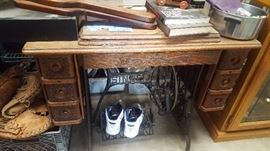 Antique sewing machine highly carved