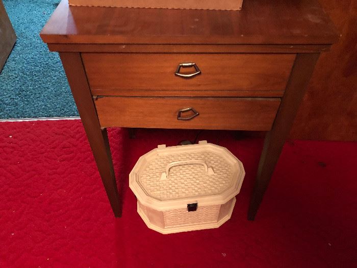sewing cabinet with singer machine inside