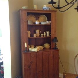 Antique Shaker Cabinet with Sampson Pottery on display