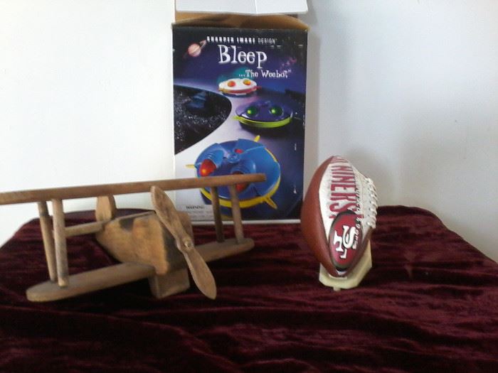  3 Toys: Wooden Plane, Small Football, Bleep Game      http://www.ctonlineauctions.com/detail.asp?id=741070