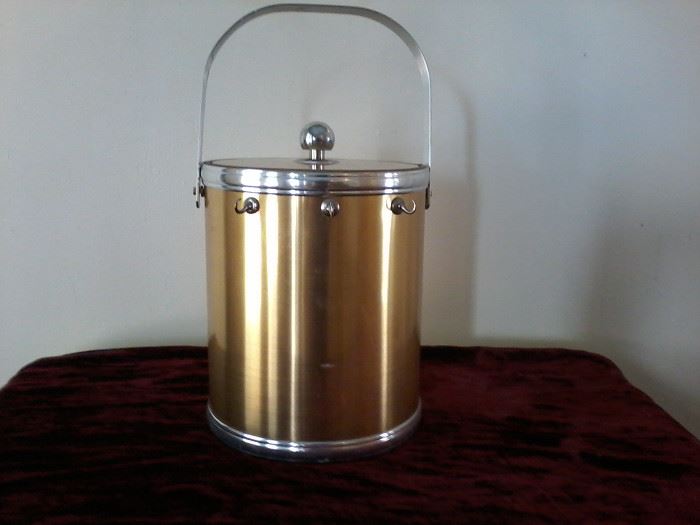  Gold Ice Bucket    http://www.ctonlineauctions.com/detail.asp?id=741073