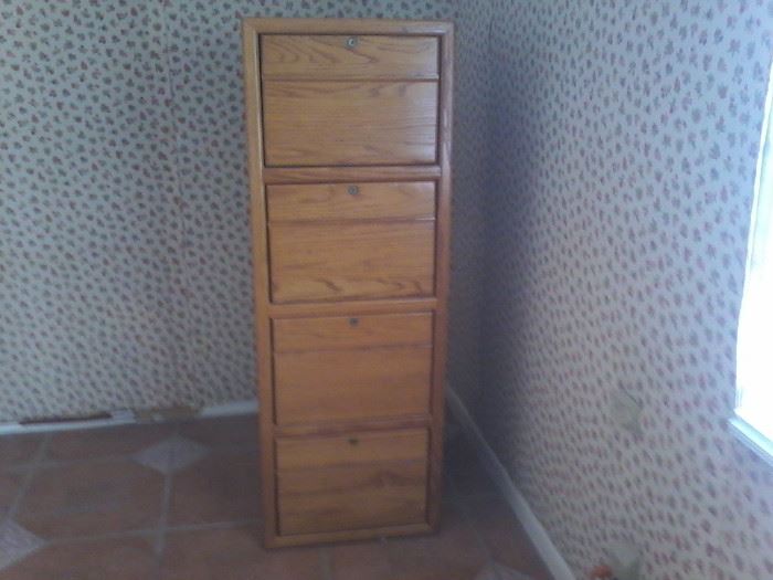 4 Drawer Wood Filing Cabinet            http://www.ctonlineauctions.com/detail.asp?id=741182