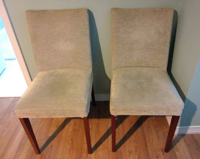 Two of a set of four upholstered  side chairs