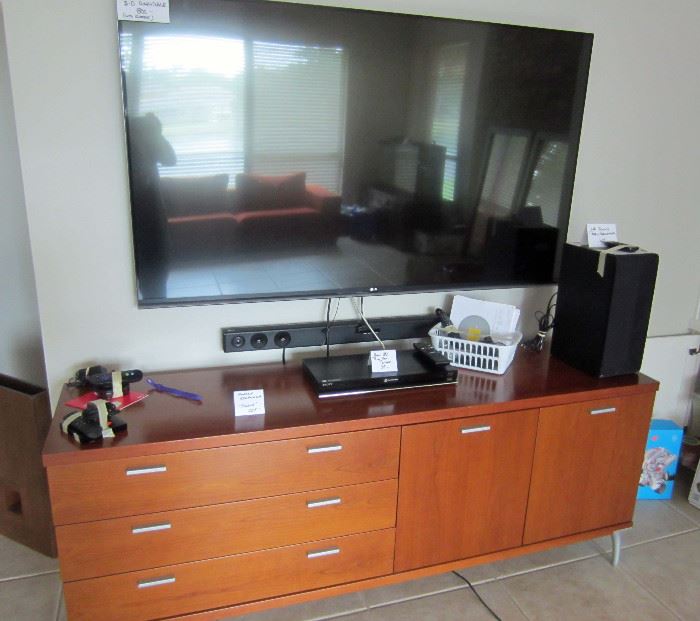 Large (60-65in) LG 3-D HDTV, LG sound bar and sub-woofer, Roku2, moderne style credenza