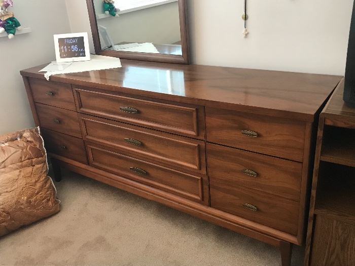 Mid-century wood dresser with mirror. Part of a set that includes a bed and two side tables
